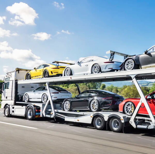 6 Porsches, 1 MAN-Truck, 1 Preis